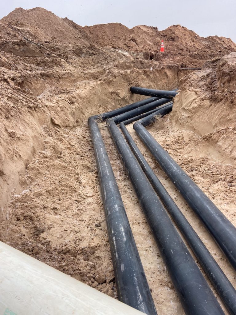 Poly pipe services by Down South Construction Services, serving Louisiana, Arkansas, Texas, Oklahoma, Kansas, Colorado, & Idaho.